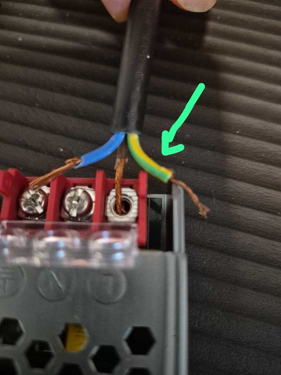 Terminal block showing proper wire insertion with ferrules