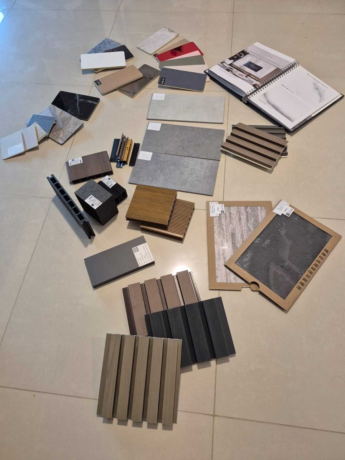 tile and material samples spread on floor
