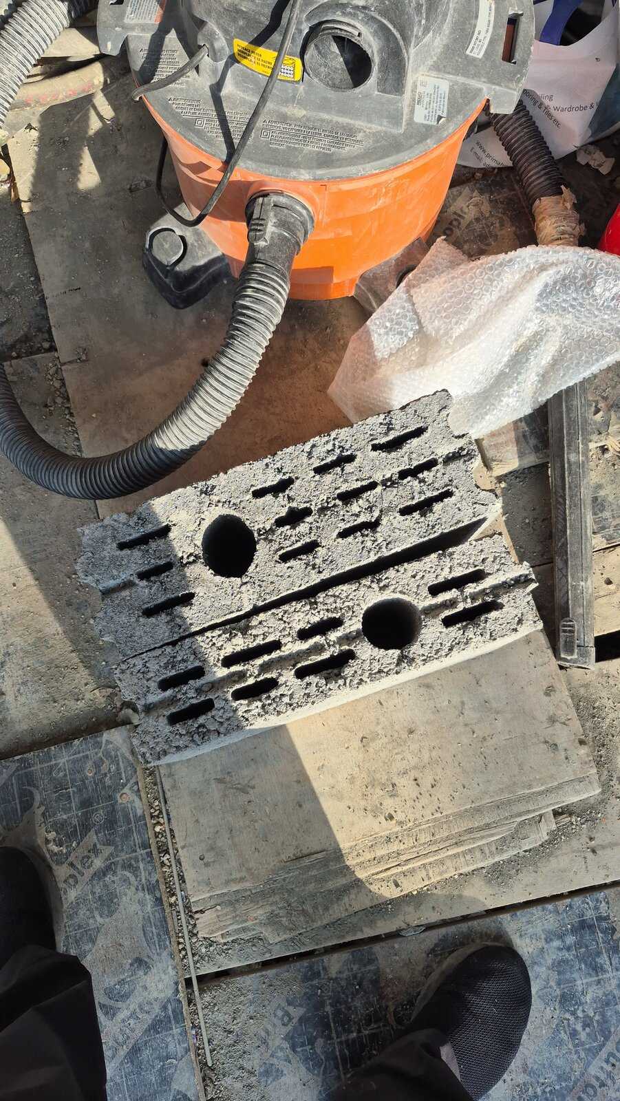 Werkhof block cut open to show its reinforcing core and narrow internal service slots