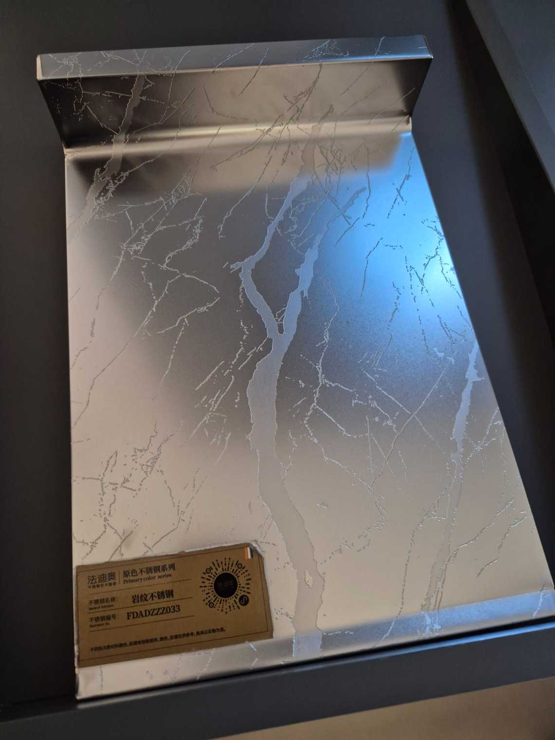 dark marble pattern countertop with sink display