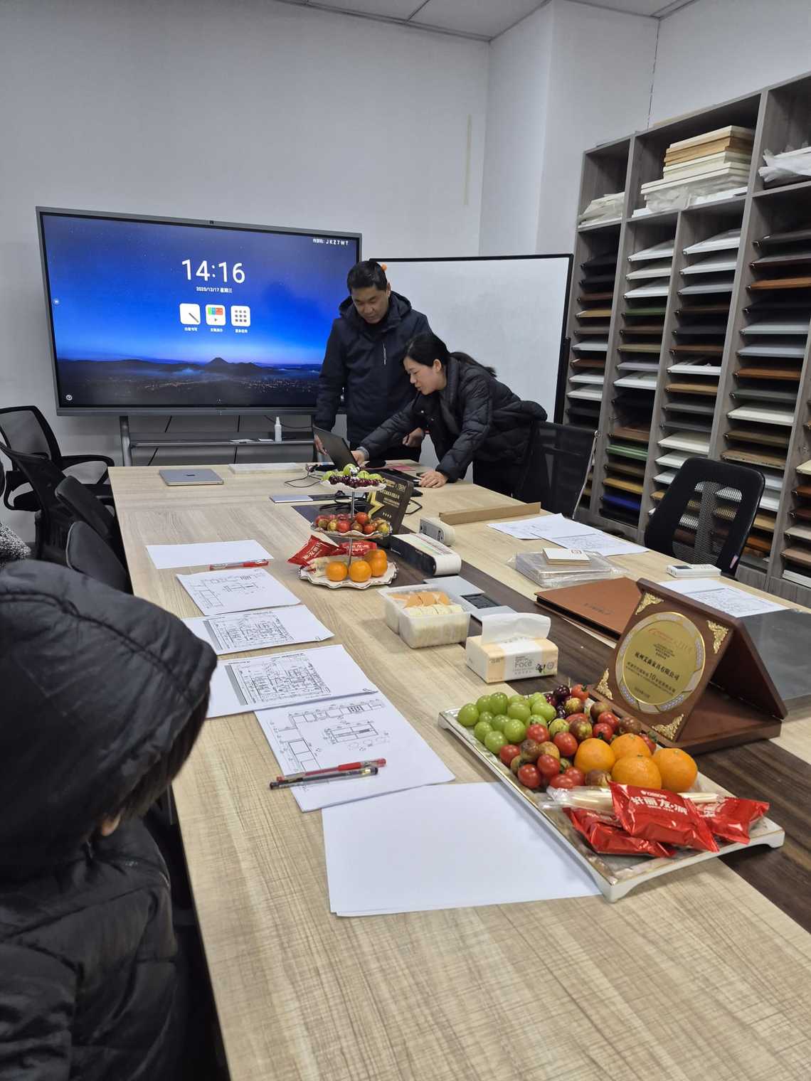 supplier meeting with samples and catalogs